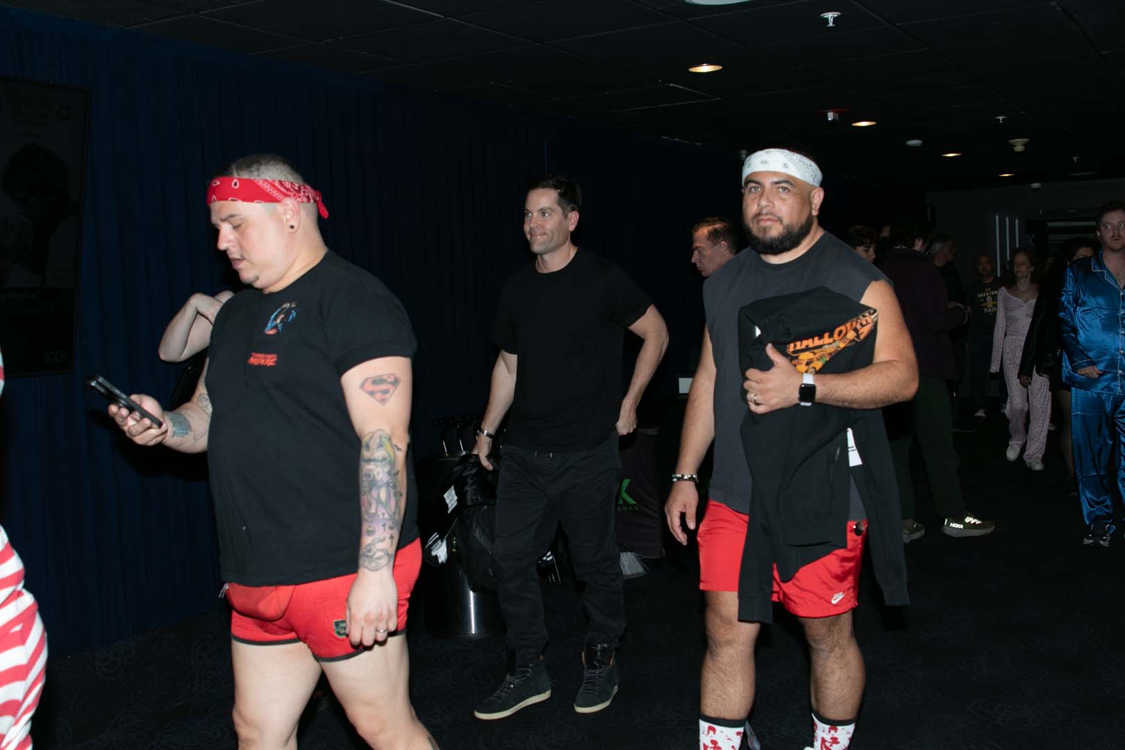 Audience members dressed for the Eighties