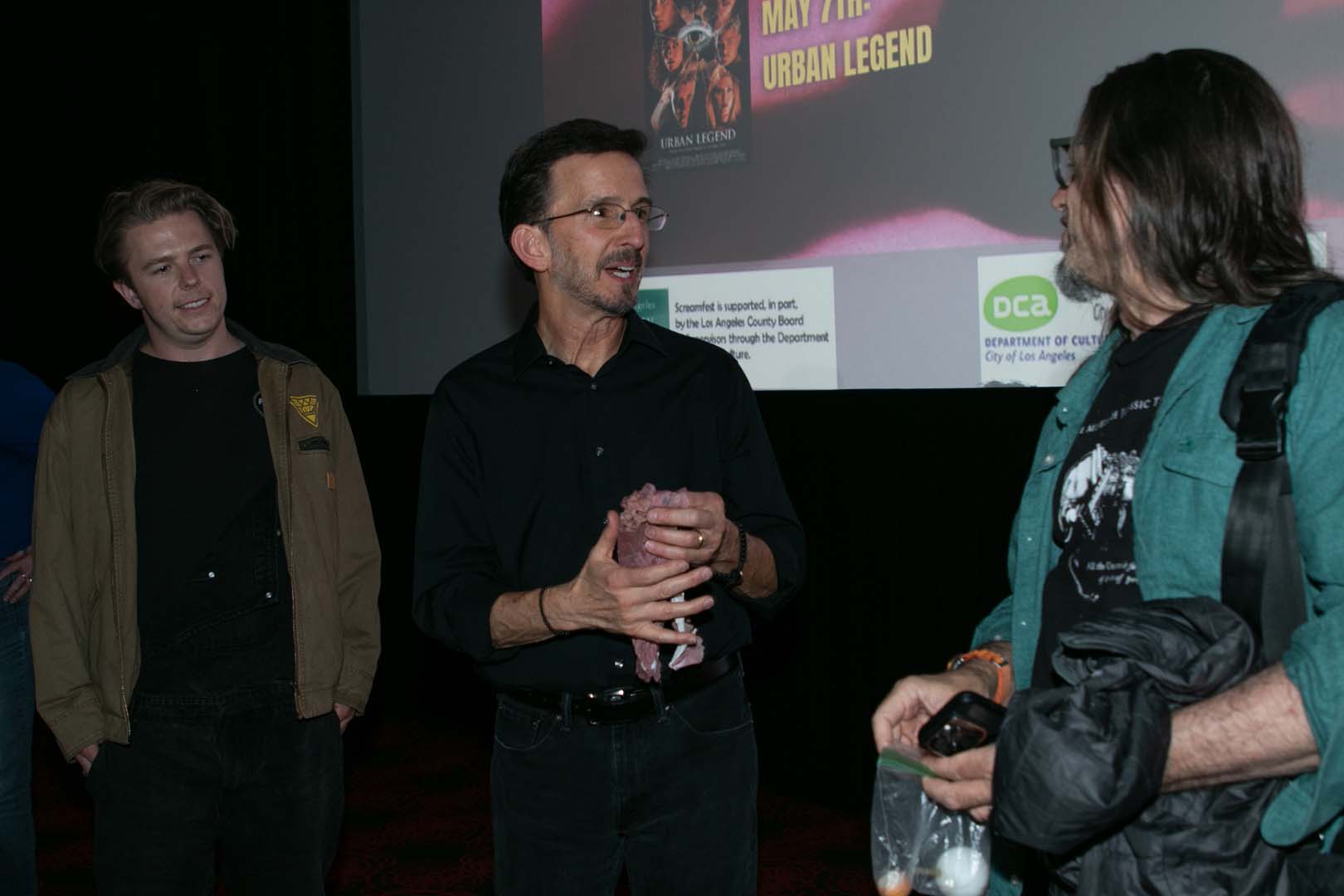 Audience members speaking with Tony Gardner